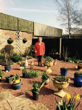 Mary Smith in her garden