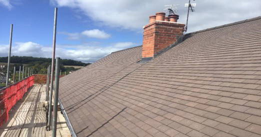 side view of a New roof installation 