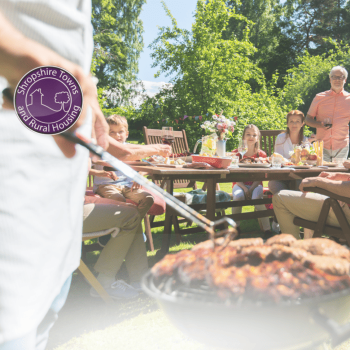 family barbeque get together with Star logo in front of the hand at the barbeque