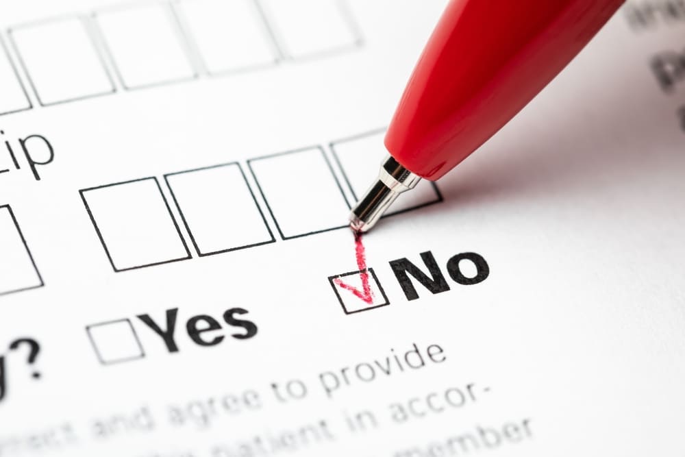 Pen with a tick over the no box