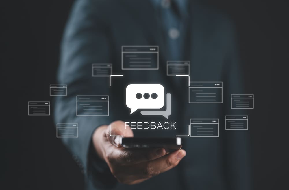 feedback text with speech bubbles above a phone