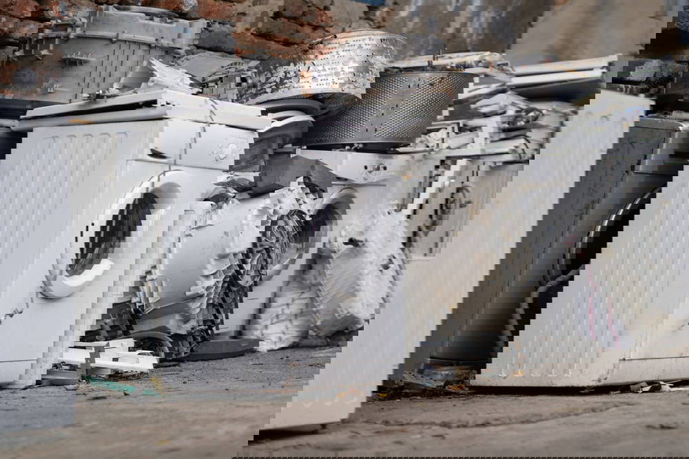 left washing machine outside